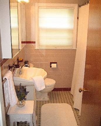 Bathroom with a large deep clo