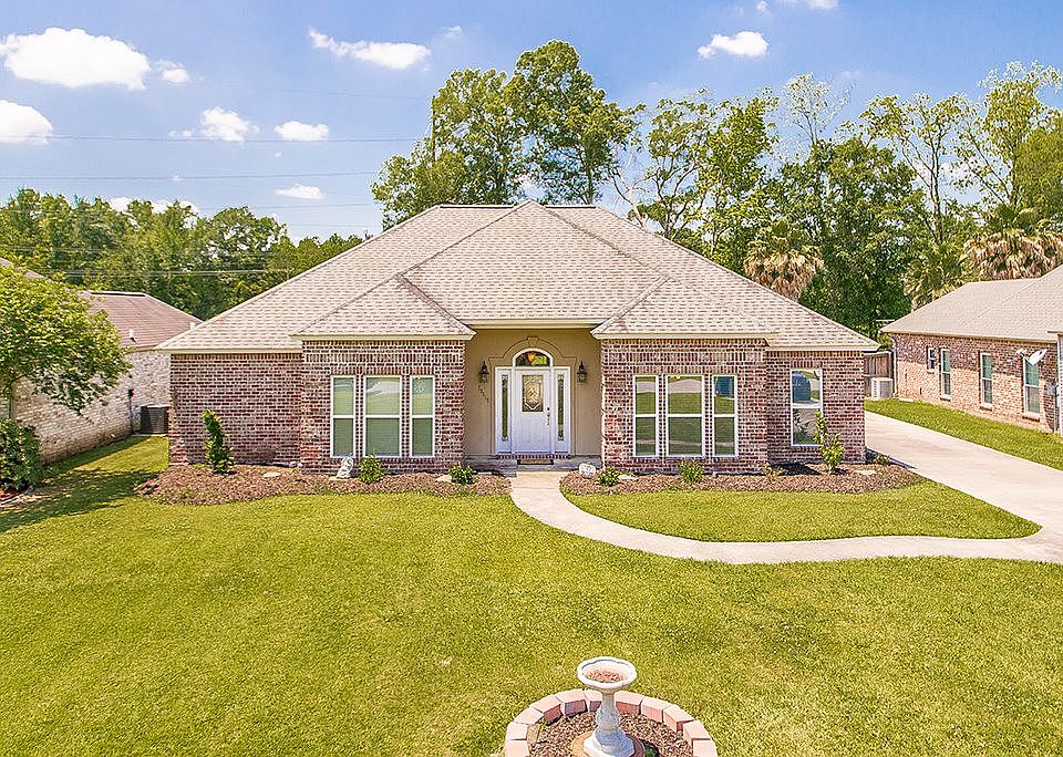 Brick house with huge yard.