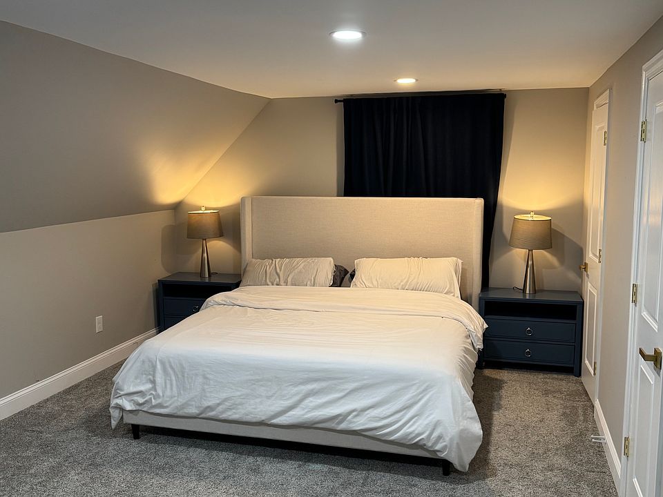 California king bed with two nightstands and lamps. Dresser is also included with 2 walking closets.