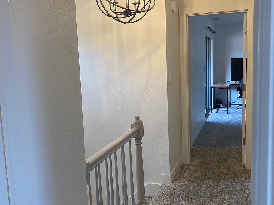 Entry to the maste bedroom. Can see the sliding glass door in the distance, on the left, that leads to private deck.