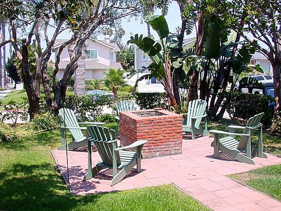 BBQ and adirondack chairs.