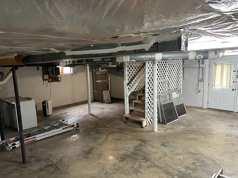 Full basement with washer and dryer. Great hobby space.