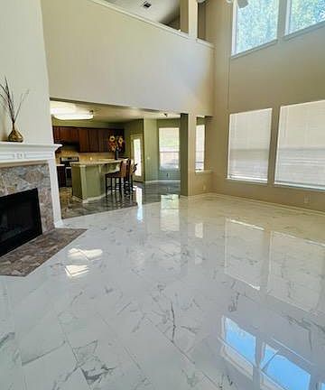 Opens to Kitchen