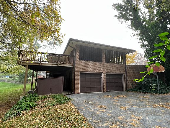 Two car garage and outside utility shed