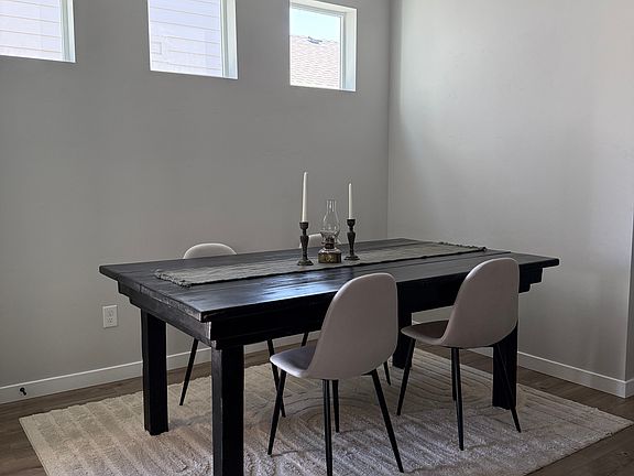 Formal Dining Area with 72" matte black-stained handmade wooden table