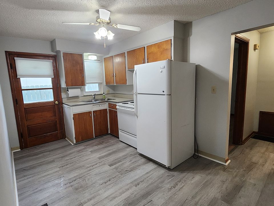 Kitchen With New Vinyl Plank Flooring