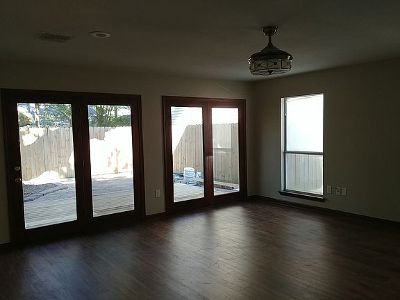 Great room looking out to deck and patio