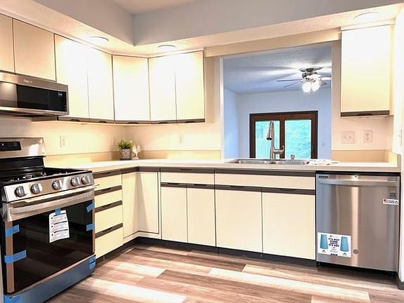 Spacious Kitchen with ALL New Stainless Steel Appliances and New Luxury Vinyl Laminate Plank Flooring