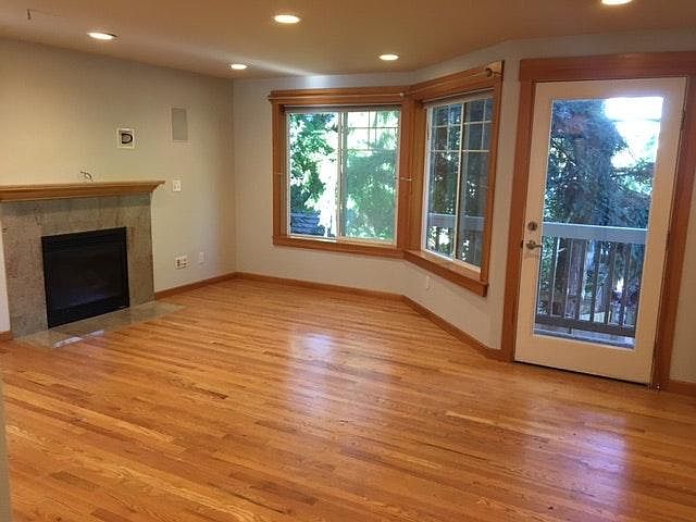 Open concept main floor, with balcony to view of back yard.