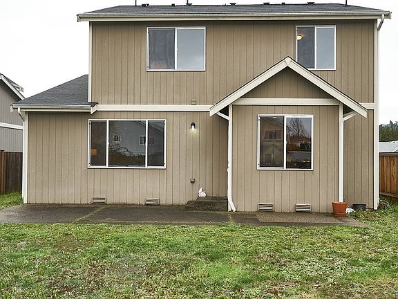 Nice cement patio with open backyard