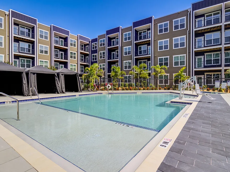 Our resort-inspired swimming pool features an expansive sundeck and private cabanas just steps from your front door.