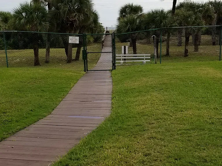 Locked private access to the beach.