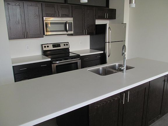 Large open kitchen with brand new appliances
