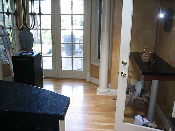 kitchen looking through french doors to slate patio