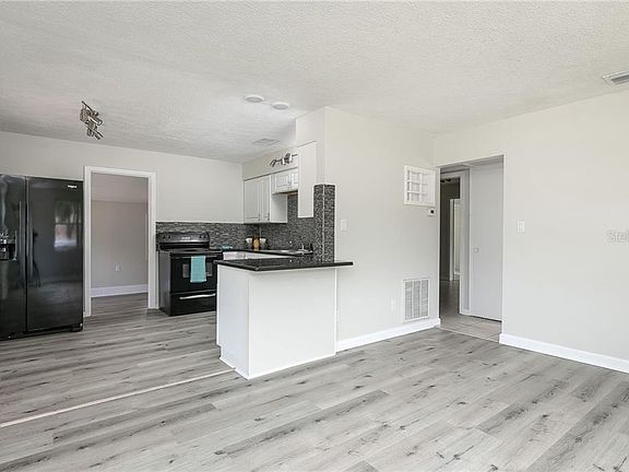 4th image of 7050 Dartmouth Ave N