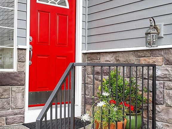 Charming front door facing South.