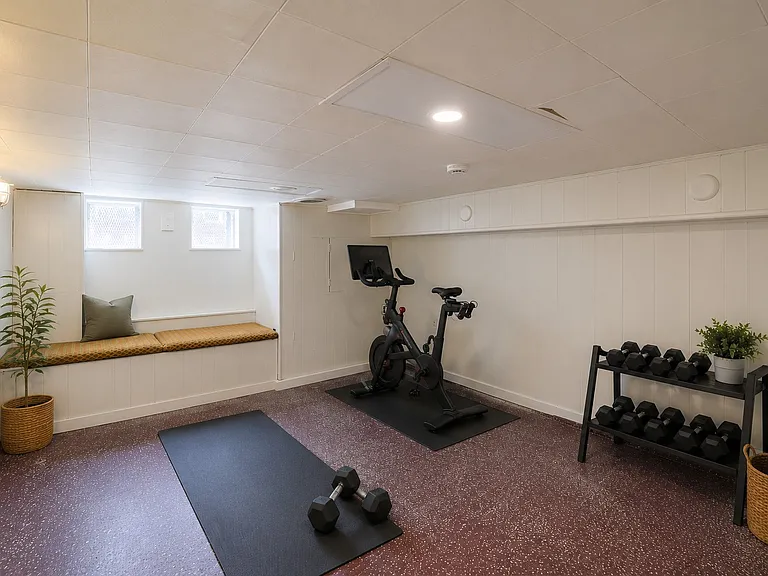 semi-finished basement, great for a home gym, office or den