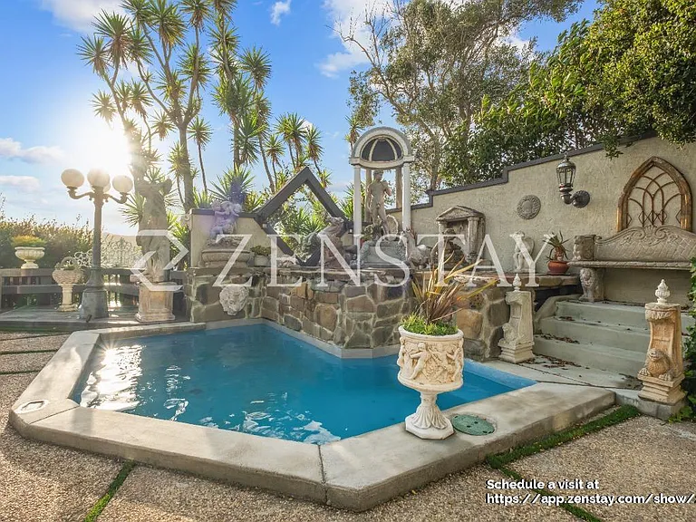 Back yard with fountains and small unheated pool