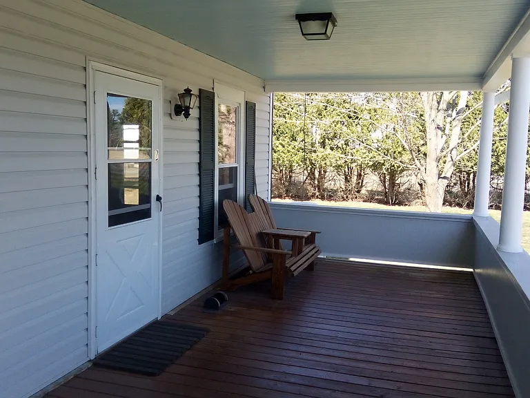 Covered front porch with Loveseat