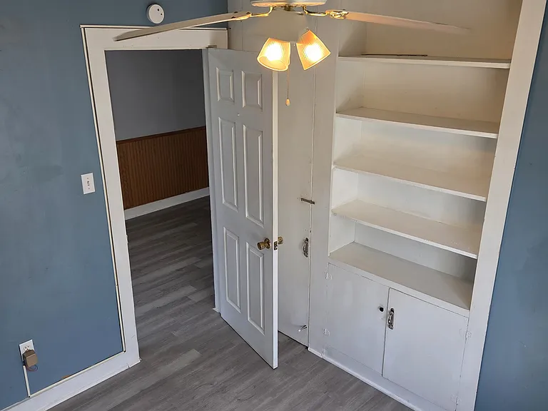 Small front bedroom 3. Would be great for office or childs room.