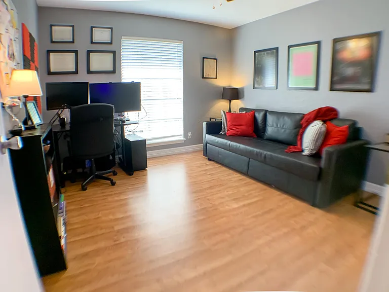 Modern, spacious second bedroom that also doubles as a great office.