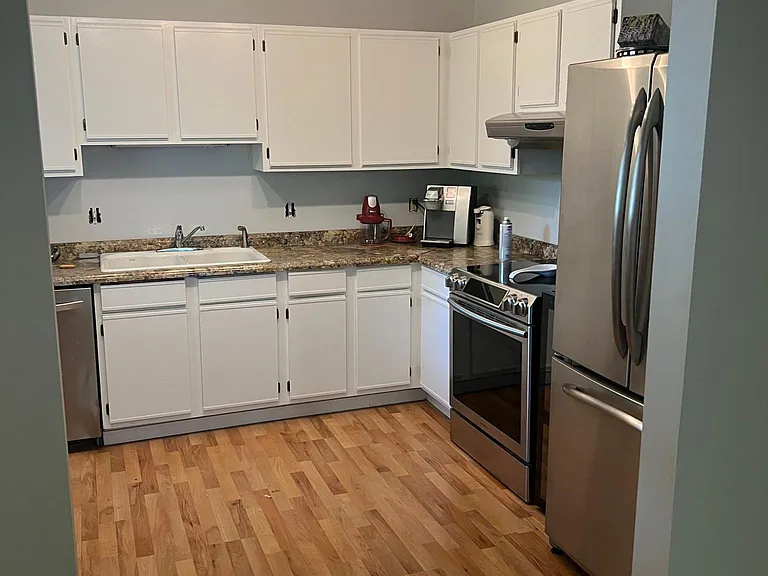 Large kitchen all stainless appliances