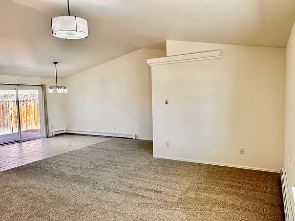 Living room and dining room looking from front door.