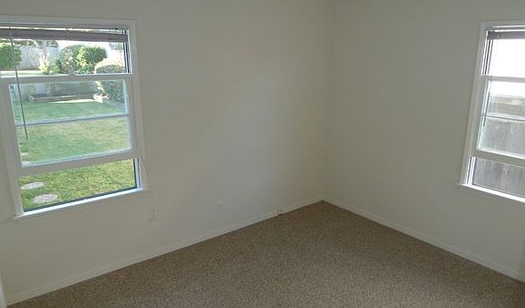 Master bedroom with backyard view