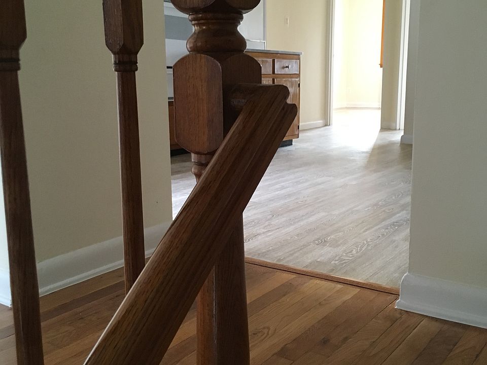 staircase entrance with hallway landing