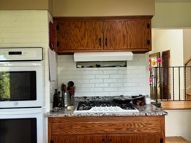 Kitchen range and ovens