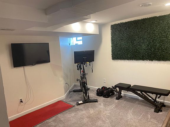 The basement area, our current workout room.