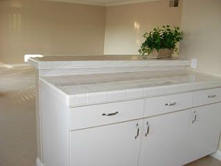 Kitchen with view of living room - perfect for entertaining.