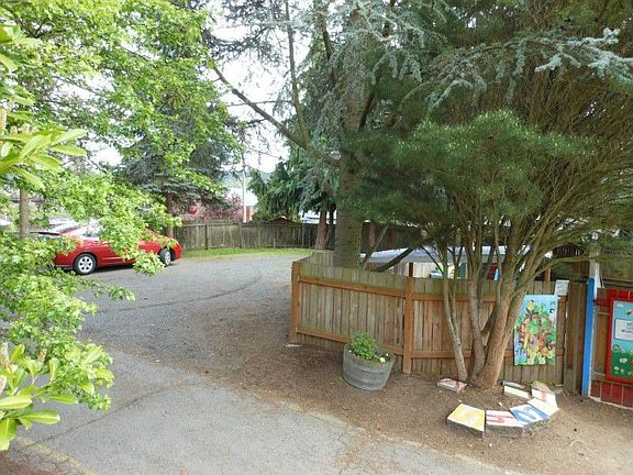 Front parking area and lovely trees
