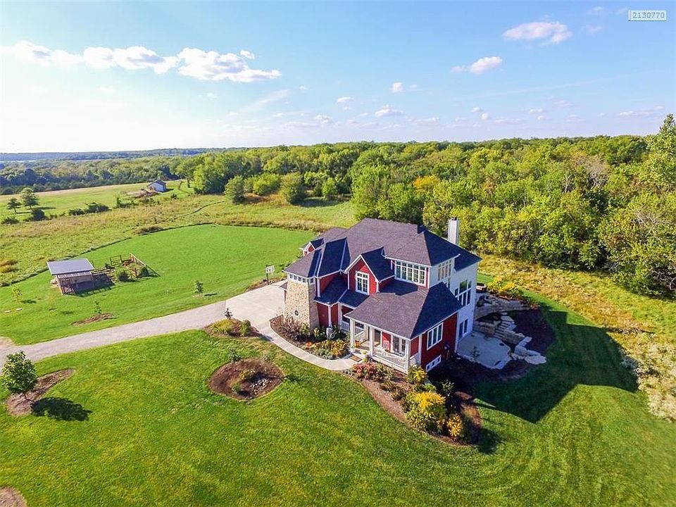 Aerial photo of home and partial land.  You can see Hillsdale lake in the distance.