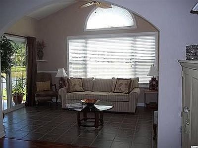 Sunroom looking out to pond