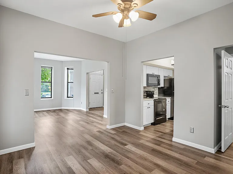 Dining room; tall ceilings throughout the unit