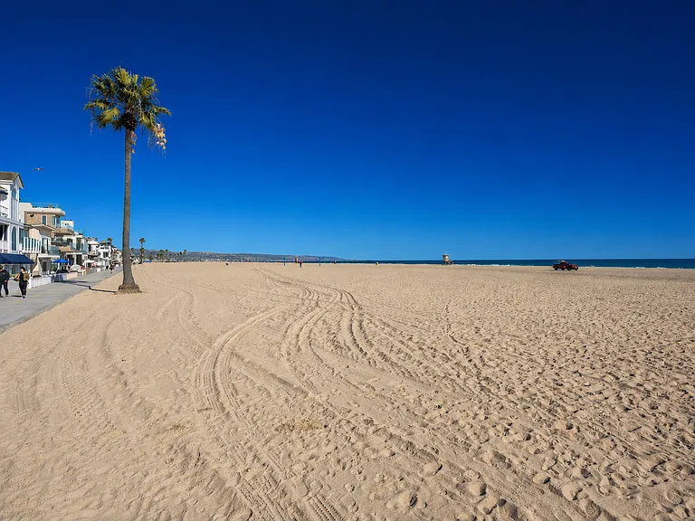 Wide sandy beach just steps away for sun and relaxation