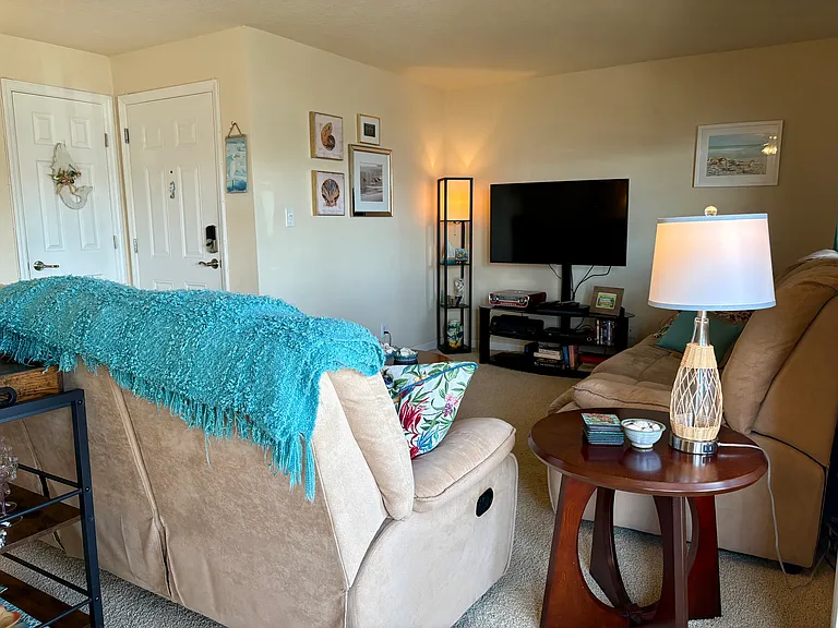 Couch opens to a sleeper sofa with a new Queen mattress