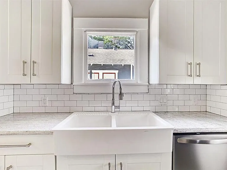 New kitchen sink, counters, cabinets, dishwasher