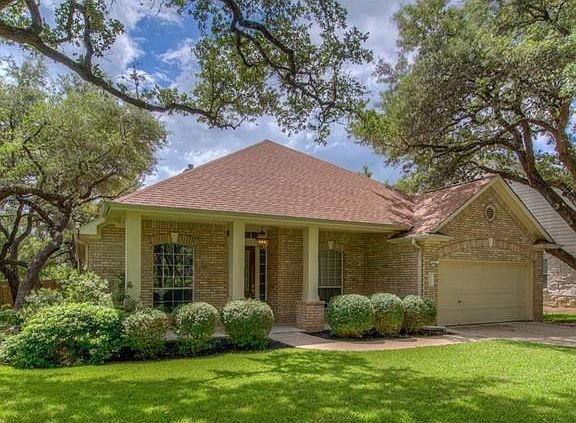 Brick & hardiplank exterior, full gutters with leaf guards, and front & side sprinklers make it a very low maintenance home.