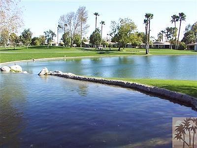 Home is over looking two lakes and Golf Course