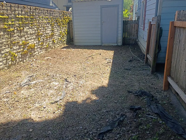 Backyard with lockable storage shed