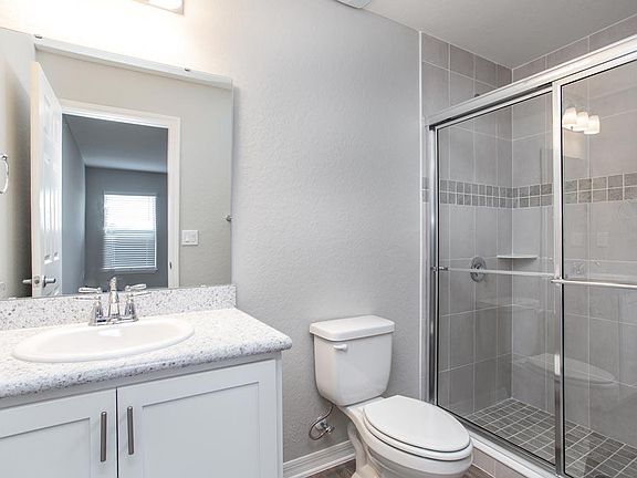 Private en-suite owner s bath - New home for sale in Lake Alfred, FL. Photo showcases the home layou