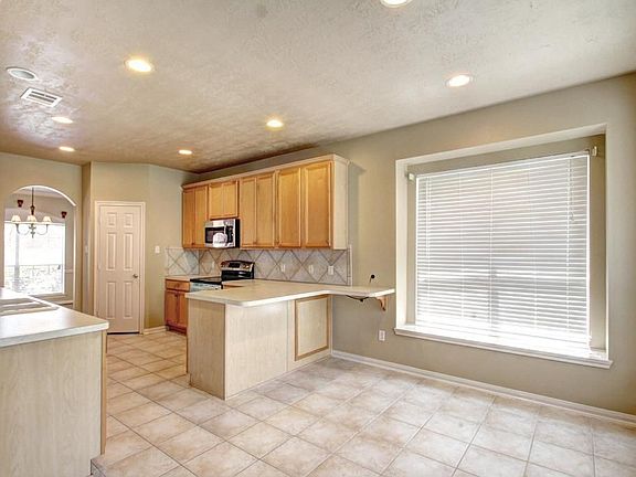 BREAKFAST AREA - The perfect area to gather family and friends around for a meal.