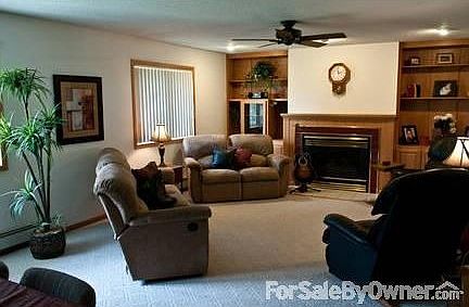 Living Room : -Gas fireplace -Connected to large dining room