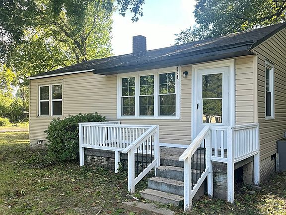 Front view and parking area.