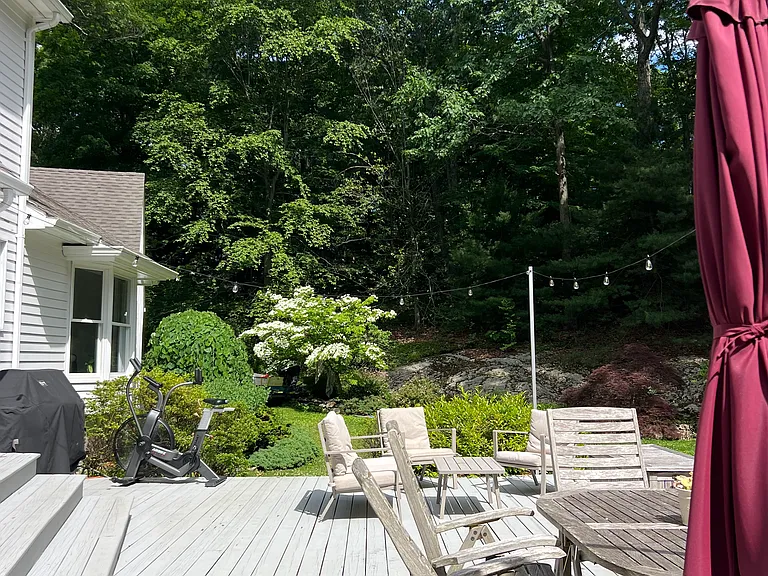 Back deck with views of the large 4 acre backyard