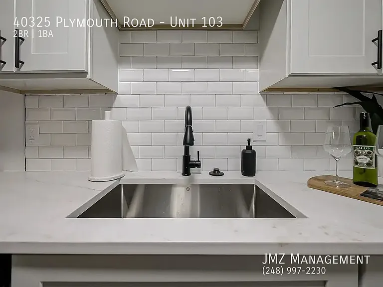 40325 Plymouth Rd #103 — Photo 43