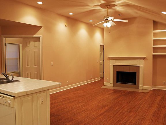 Kitchen opens to Famliy Room with wood-burning fireplace