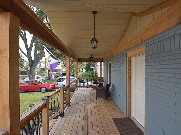 Enjoyable large Cedar front porch with 2 ceiling fans welcomes you onto this property.